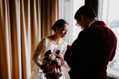 Bride and groom getting ready together
