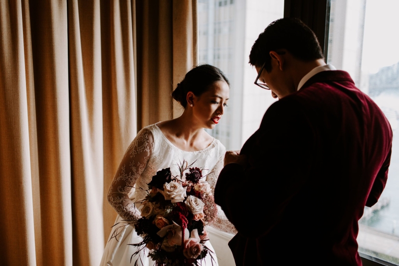 Bride and groom getting ready together