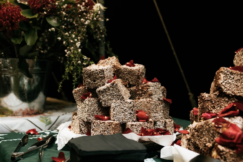 The wedding cake is homemade lamingtons