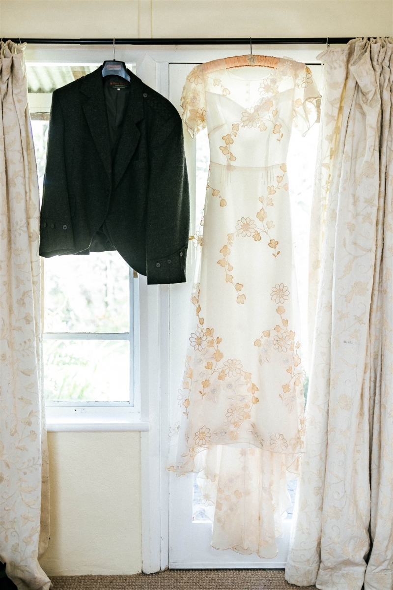 A bride's vintage dress and a groom's kilt