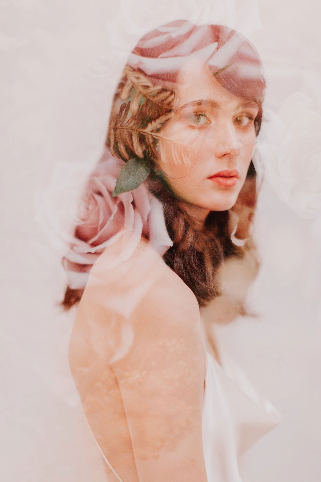 Bride in a once-worn gown holding a foam-free bouquet of Australian-grown flowers